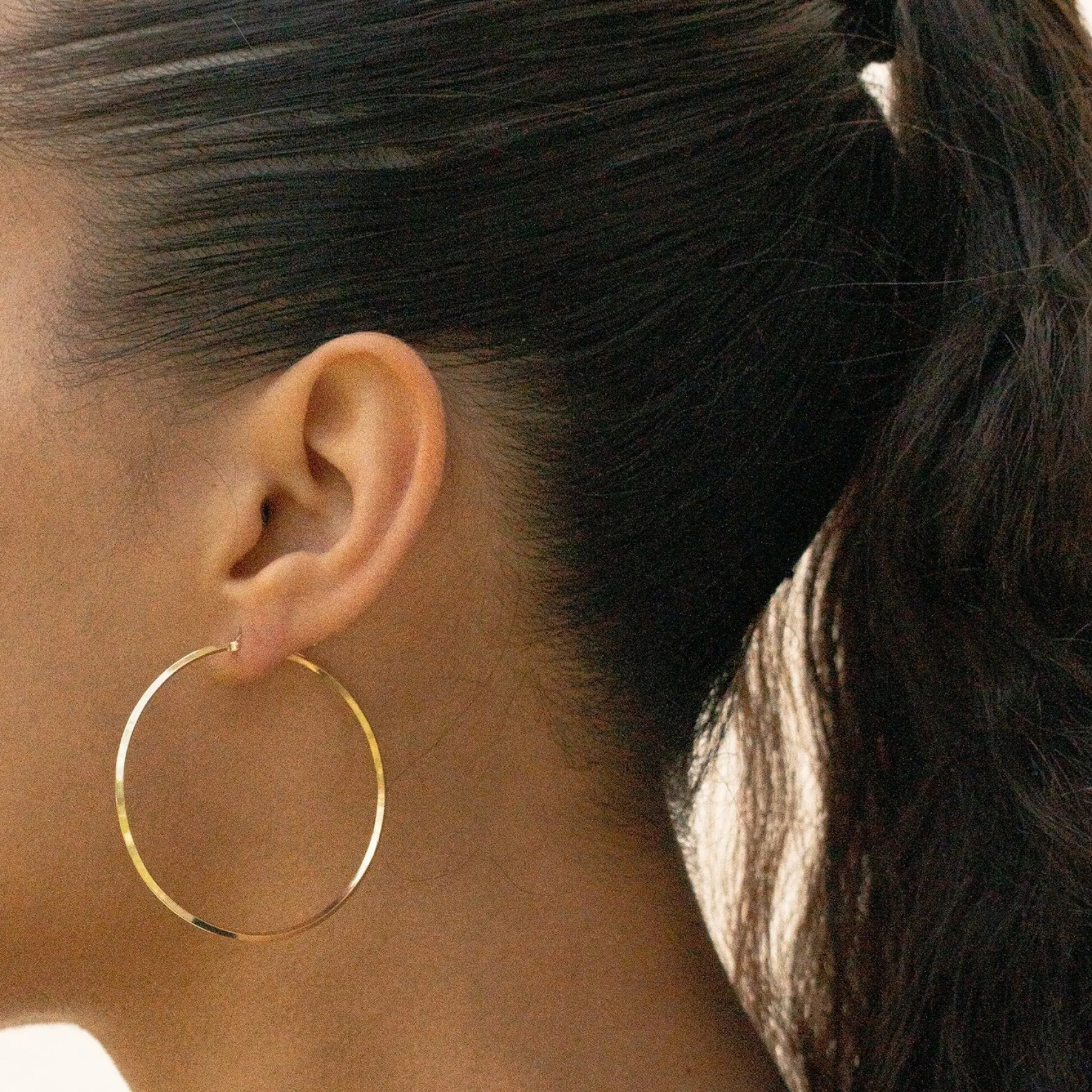 large_cape_gold_vermeil_hoops_1.webp SarahBijoux Large cape gold vermeil hoops